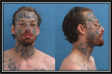 An image of a tattoed man