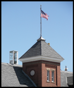 "Lincoln's 'conversation piece' - the phone booth perched atop City Hall." The Lincoln Police Department was also located inside the City Hall in 1975 and '76.